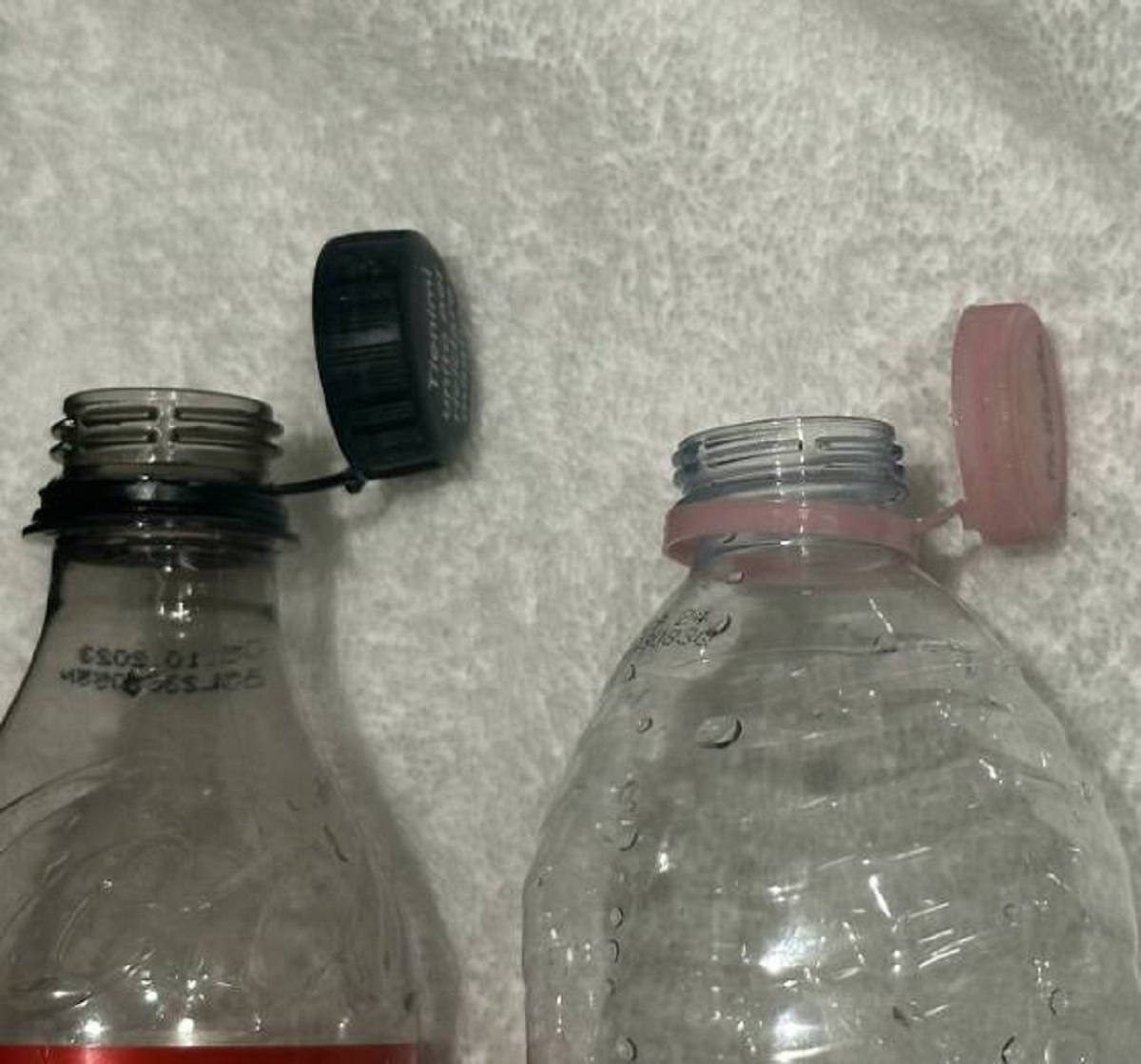 "Bottle Caps In Italy Designed To Stay Attached To Bottle"