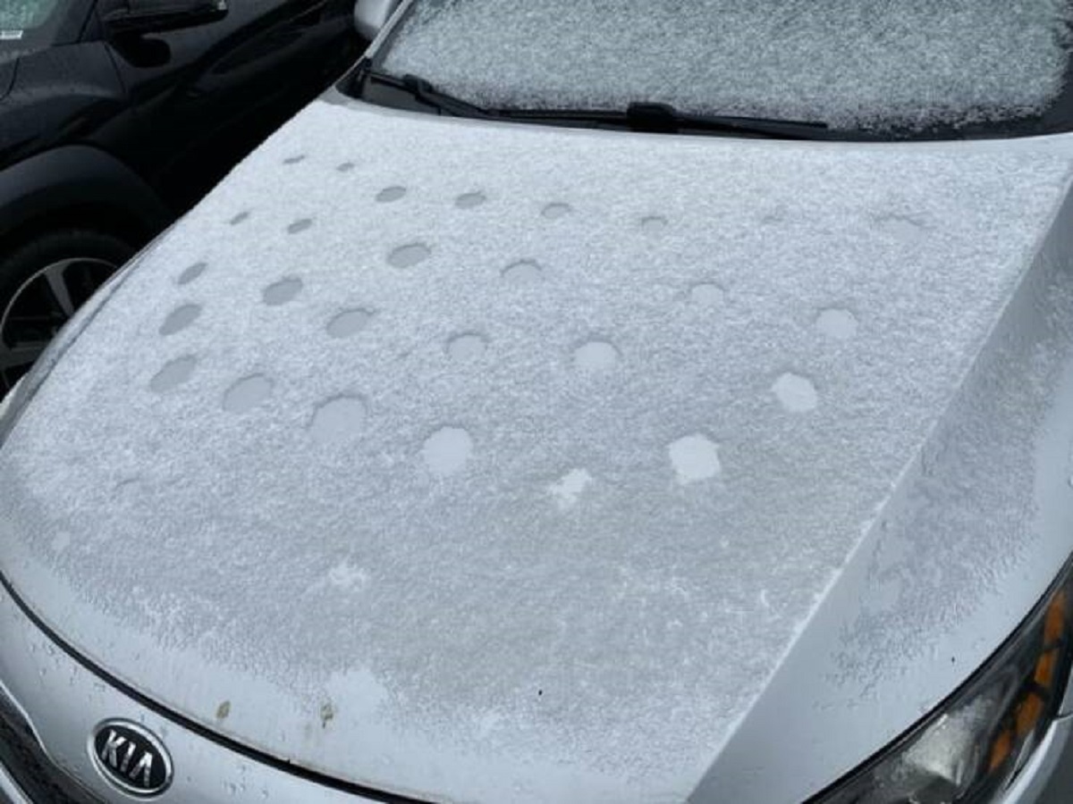 "Snow pattern on the hood of this car."