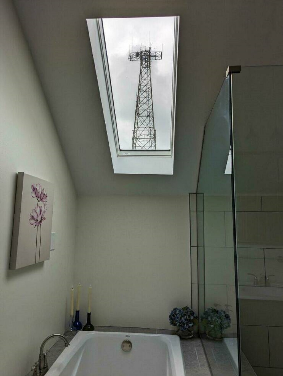 "Installed A Lovely Sunlight In My New Bathroom, Without Realizing It Would Perfectly Frame That Horrid Tower"