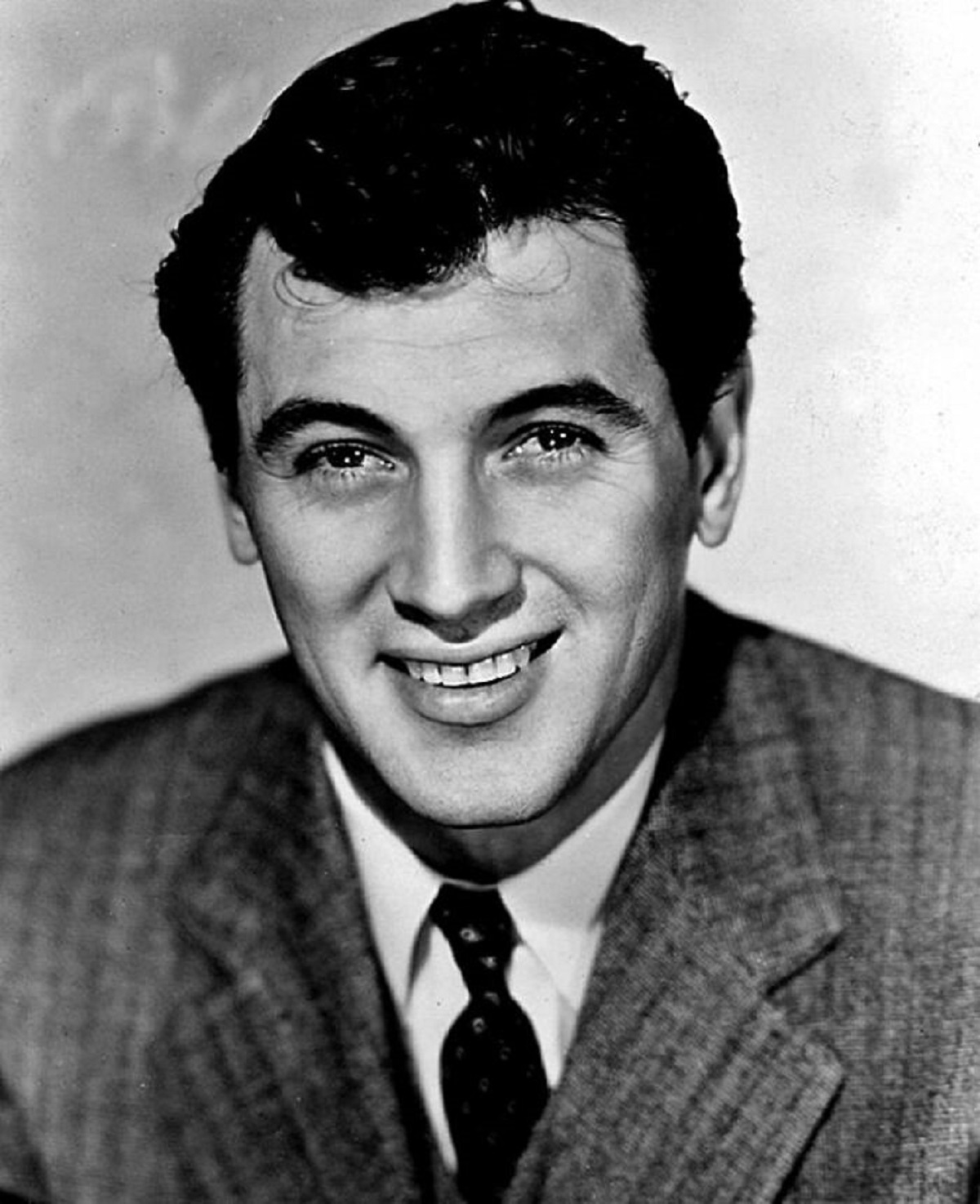 I posted this a month ago in response to a similar question:

When I was in High School in the 70s, in English class, we were having a discussion on what Hollywood stars were hot (not sure how that conversation started). Anyway, one of the students asked our teacher Miss W. if she thought Rock Hudson was hot. She said, "Yes, but he's gay". Everyone was shocked and asked how she knew. "I have a lot of gay friends and they always talk about who in Hollywood is gay and they tell me he's gay".

What's amazing is this was pre-internet. We were in the Midwest in a small town. The only gay people we knew at the time were the Village People and perhaps Paul Lynne. (The fact that our teacher had gay friends was a shocker) At the time, my best friend was gay and in the closet (even to me). How this tidbit travelled is pretty remarkable.