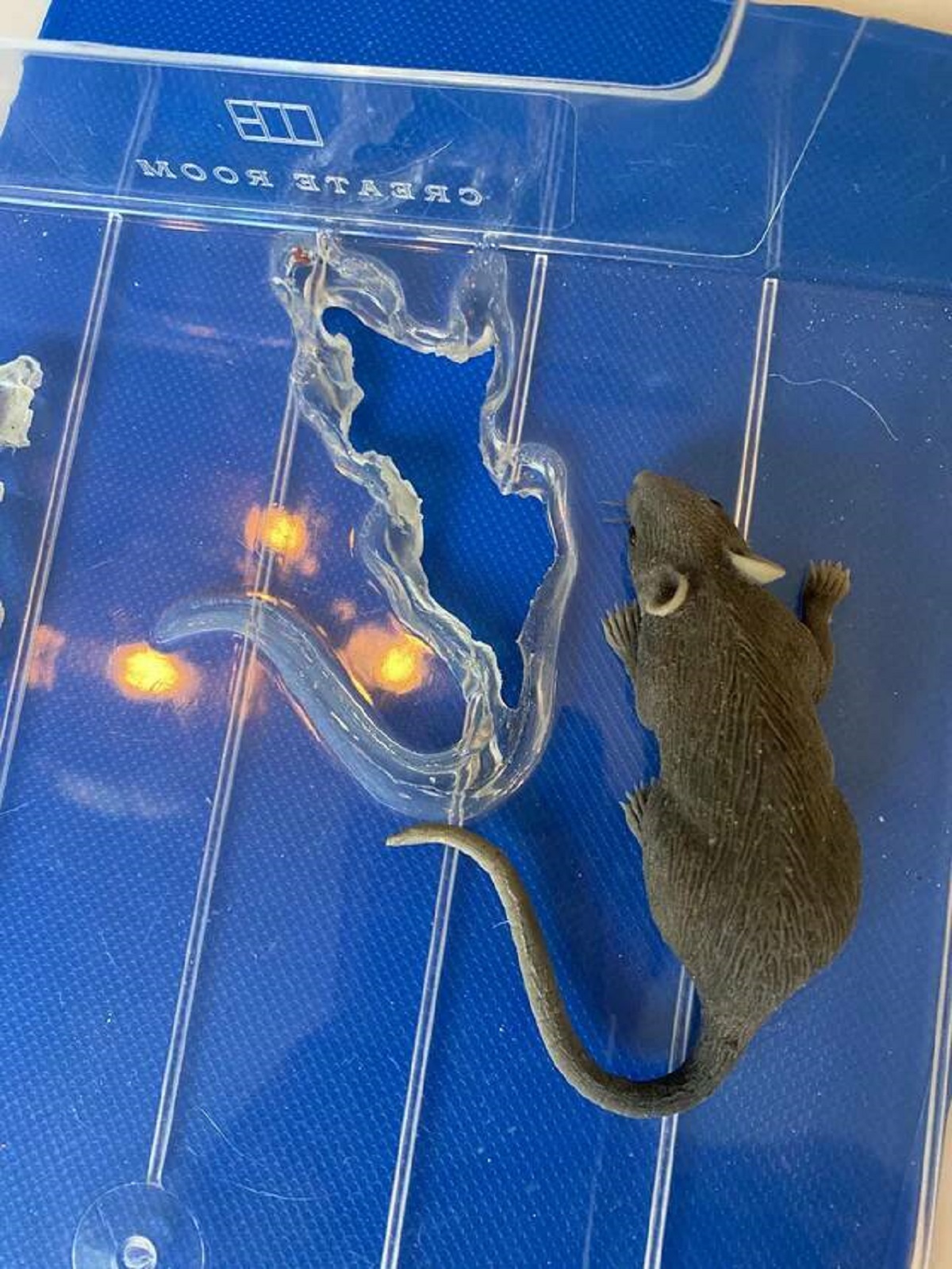 "This fake rat “melted” through the plastic of this drawer"