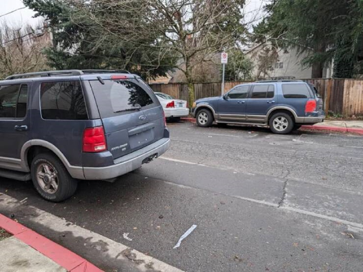 "The same car, the same color and both illegally parked and both without tags or plates"