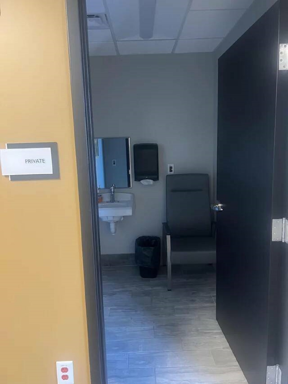 "The building I’m working in today has a room marked private with only a chair, sink, mirror, and trash can."