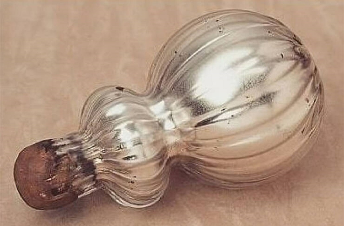 "Silvered Glass Bottle Said To Contain The Spirit Of A Witch Inside. It Was Collected In 1915 From An Old Lady Living Near Hove, Sussex, Who Sternly Warned That If You Opened The Wax Seal There Would Be A "Peck O'trouble""