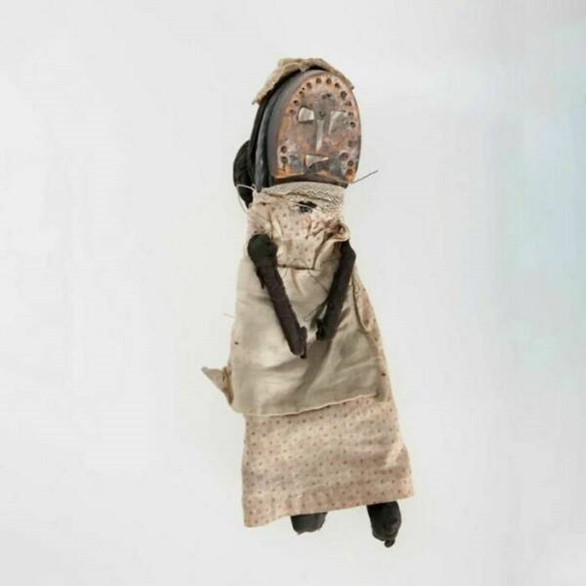 "Shoe Doll That Belonged To A Child In The Slums Of London In The Early 20th Century. It Is Handmade From Fabric Scraps And The Heel Of A Man's Delapidated Shoe, With Hair Made From An Old Black Sock"