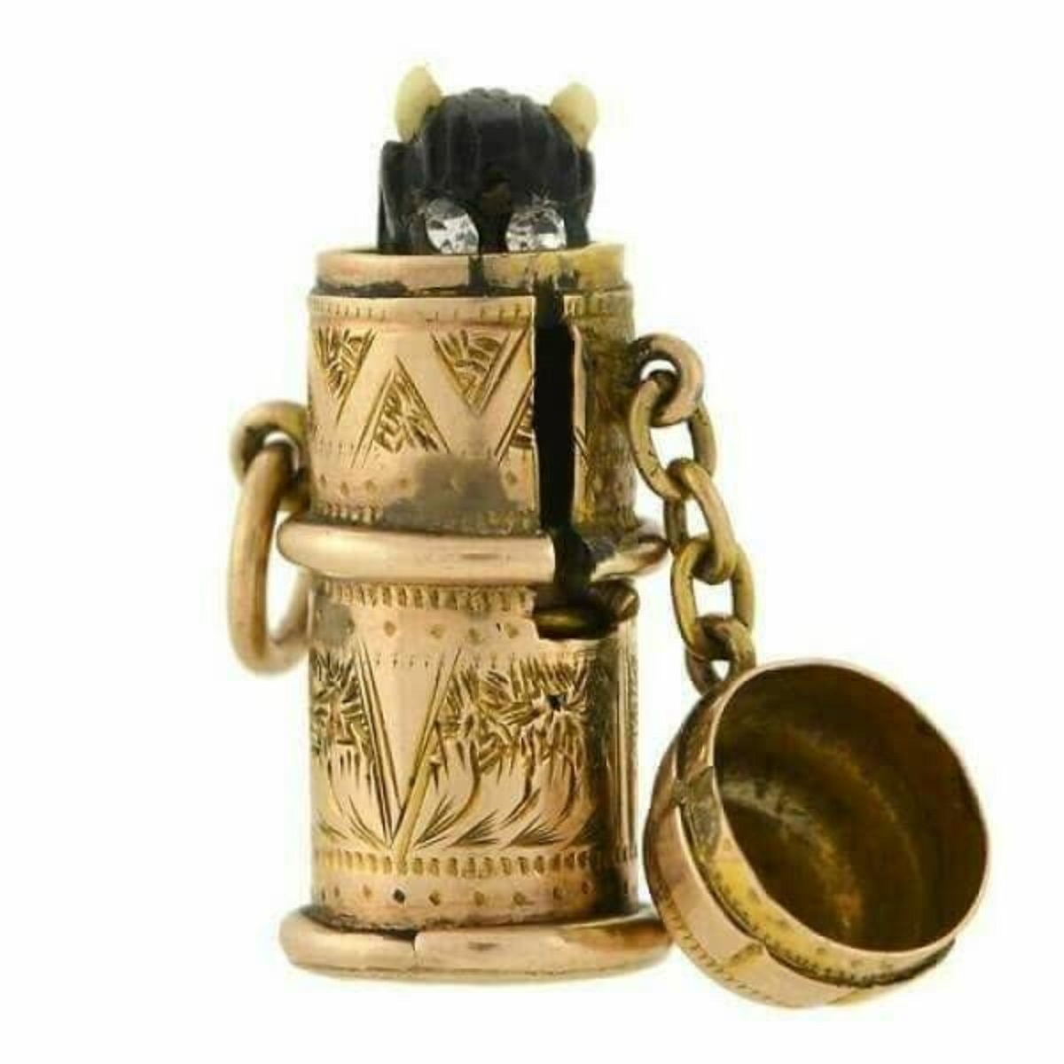 "When The Lid Is Opened On This Victorian Gold Charm, A Little Demon With Sparkling Rhinestone Eyes Pops Out. These (Frankly Adorable) Devil Totems Were Worn As Symbols Of Temperance -- A Reminder To Resist The Sinful Temptation Of Drinking Alcohol"