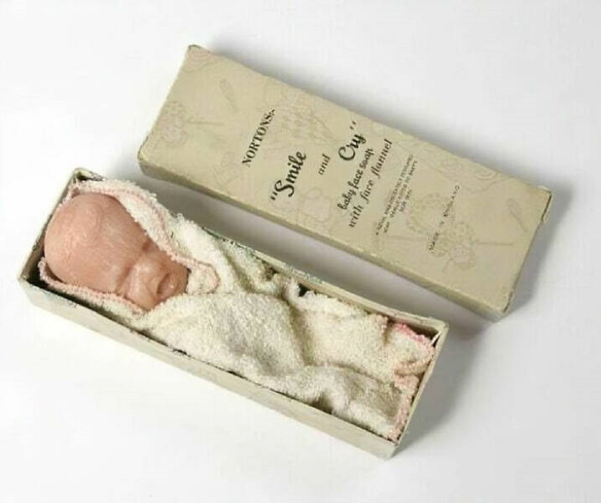 "Keep Your Face Looking Youthful By Washing It With The Tears Of Children!⁣ ⁣ Norton's "Smile And Cry" Baby Face Soap With Face Flannel, 1930-39. There Is A Laughing Face On The Other Side Of The Baby's Head And I Honestly Don't Know Which Option Is Worse"