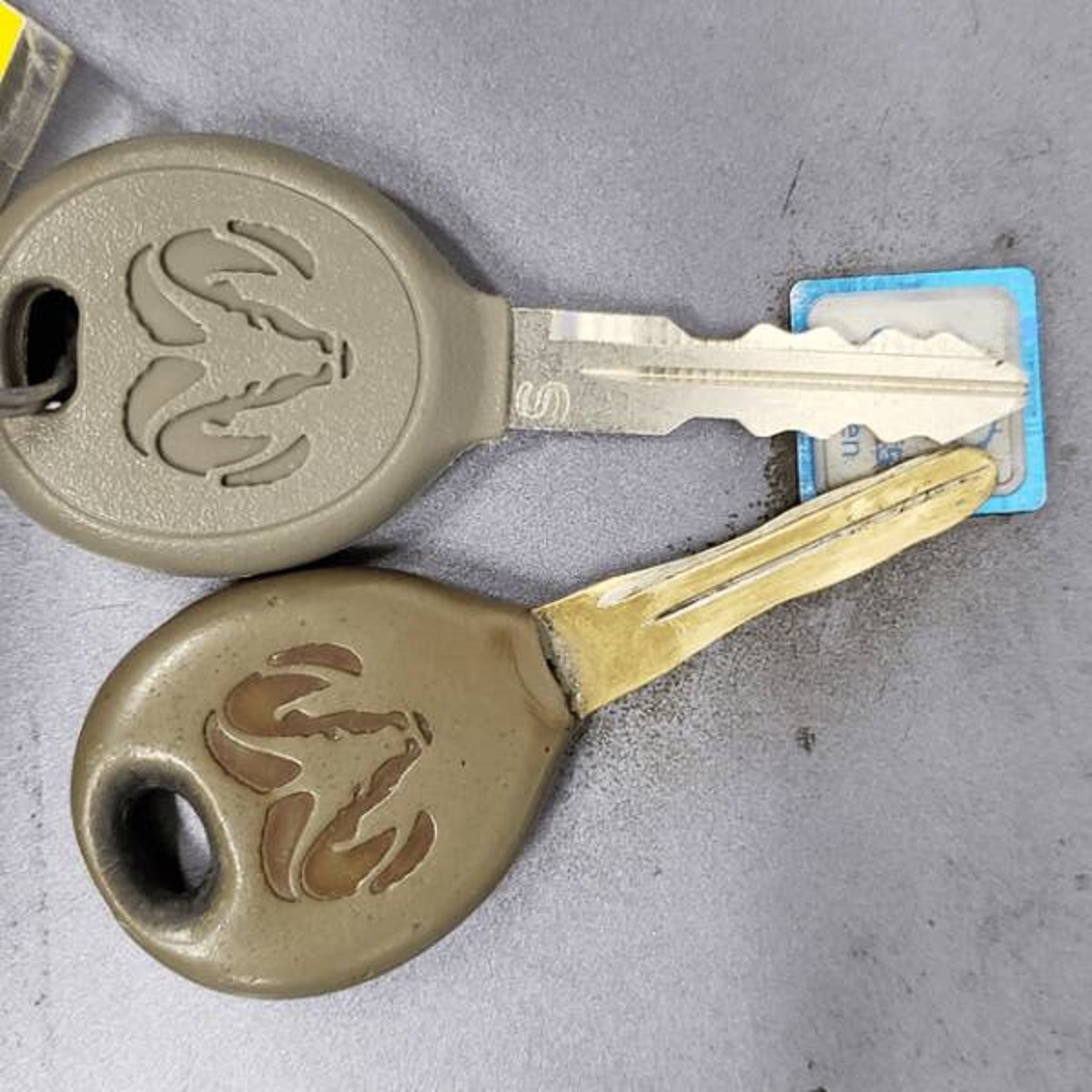 "This old worn key vs. a fresh cut one for the same vehicle"
