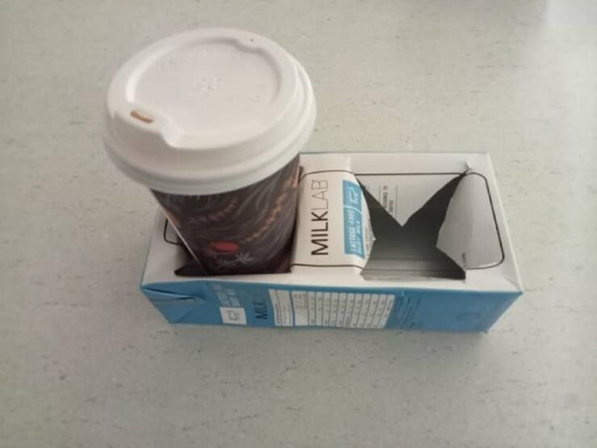"My local cafe uses old milk containers for cup holders"