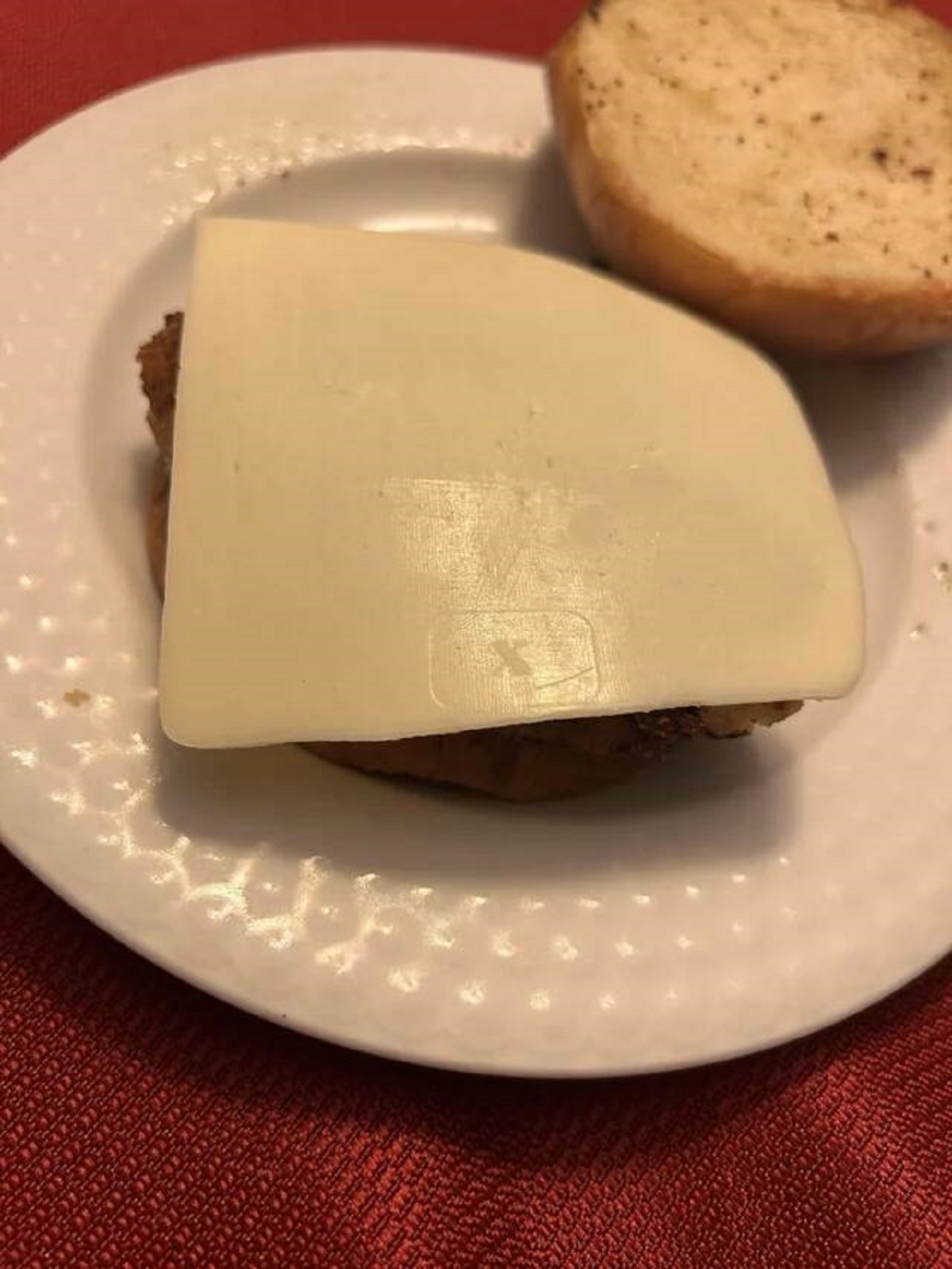 "My piece of cheese has an “x” printed on it (mozzarella)"