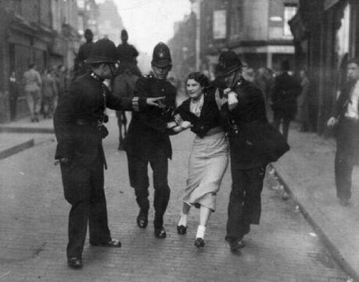 A Lady Is Arrested During The Battle Of Cable Street, 1936. For Those Unaware, The Battle Was Between The Residents Of East London And Oswald Mosley's Facist Blackshirts