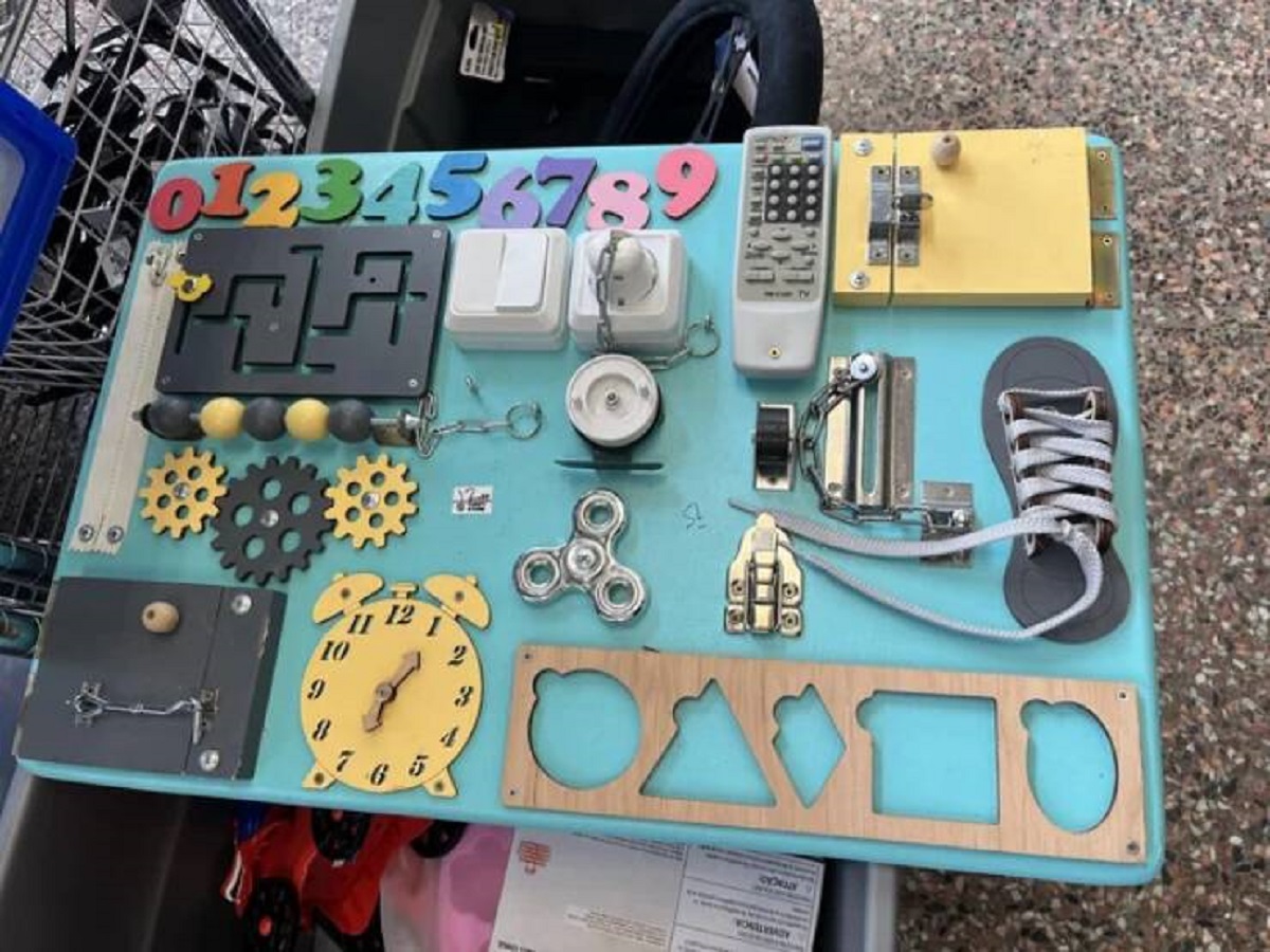 "Found a homemade busy board at a thrift store"