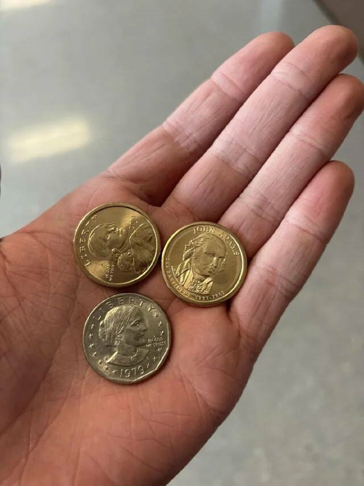 "School vending machine gave me a silver dollar coin as change"