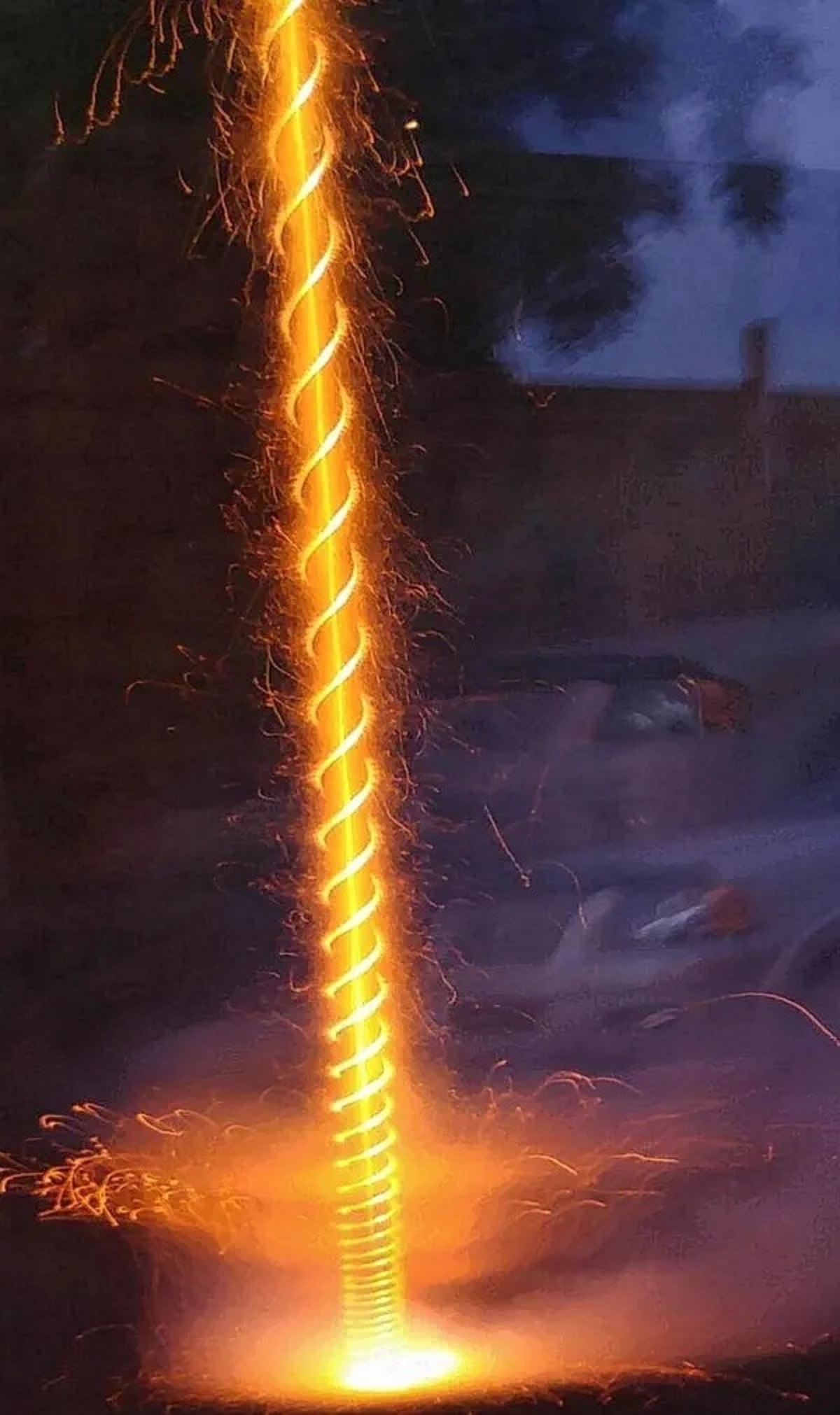 Long exposure photo of a firework going off.