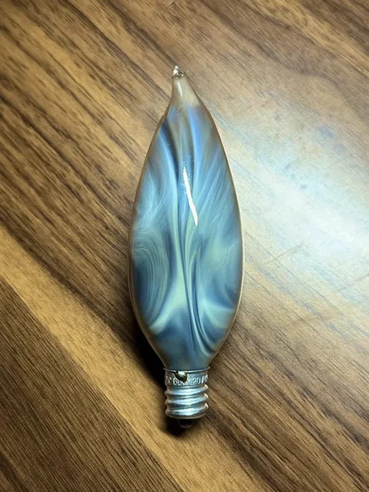 The pattern that formed inside this burnt out light bulb.