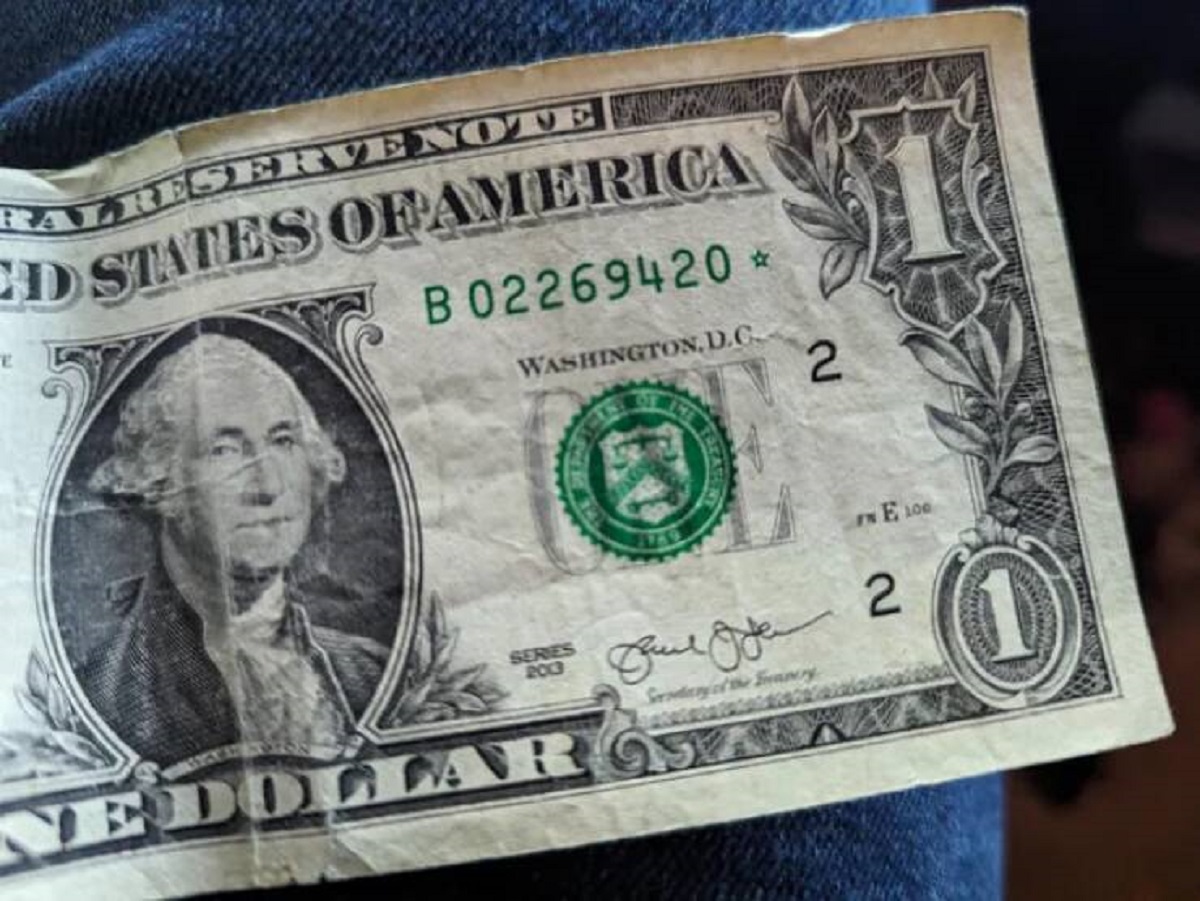 "This $1 bill has 69420 with a little star"