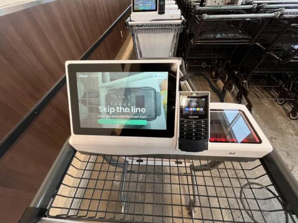 "Local grocery store has self checkout on carts"