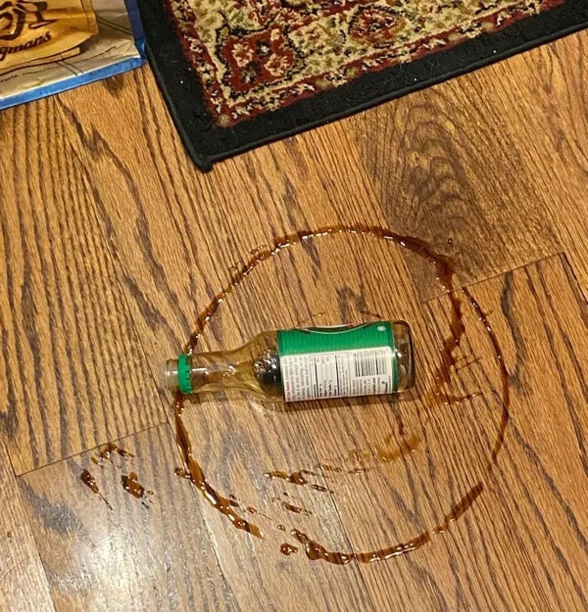 Dropped my soy sauce and it accidentally made a perfect circle.