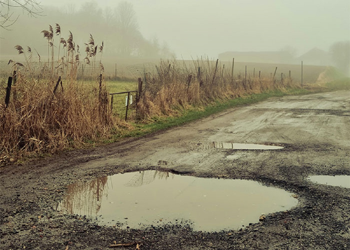 Never trust a water-filled pothole.