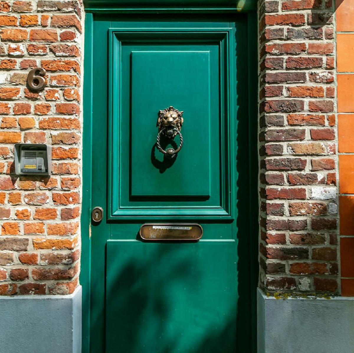 I recently read that the reason old-timey door handles/door knockers were made of brass was because brass kills bacteria.