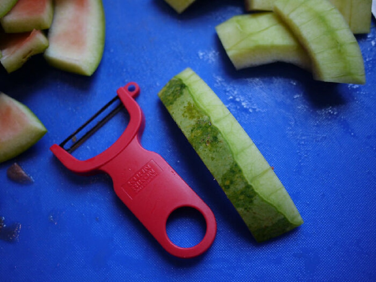 Most vegetable peelers have a metal ring on the side. It’s to dig out black spots from potatoes.