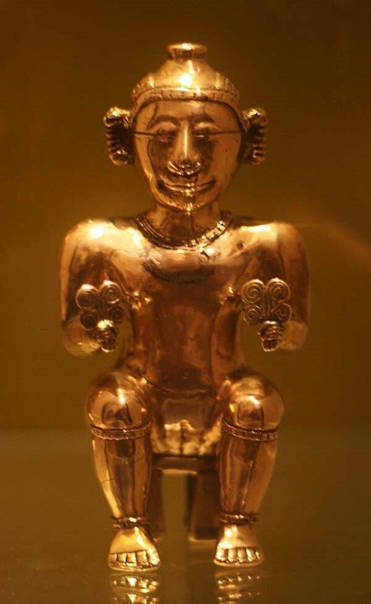 This golden container was made between the 4th and 7th centuries by the Quimbaya people (who lived in what's now Colombia). They had a lot of gold, and made stunningly beautiful and sophisticated items.