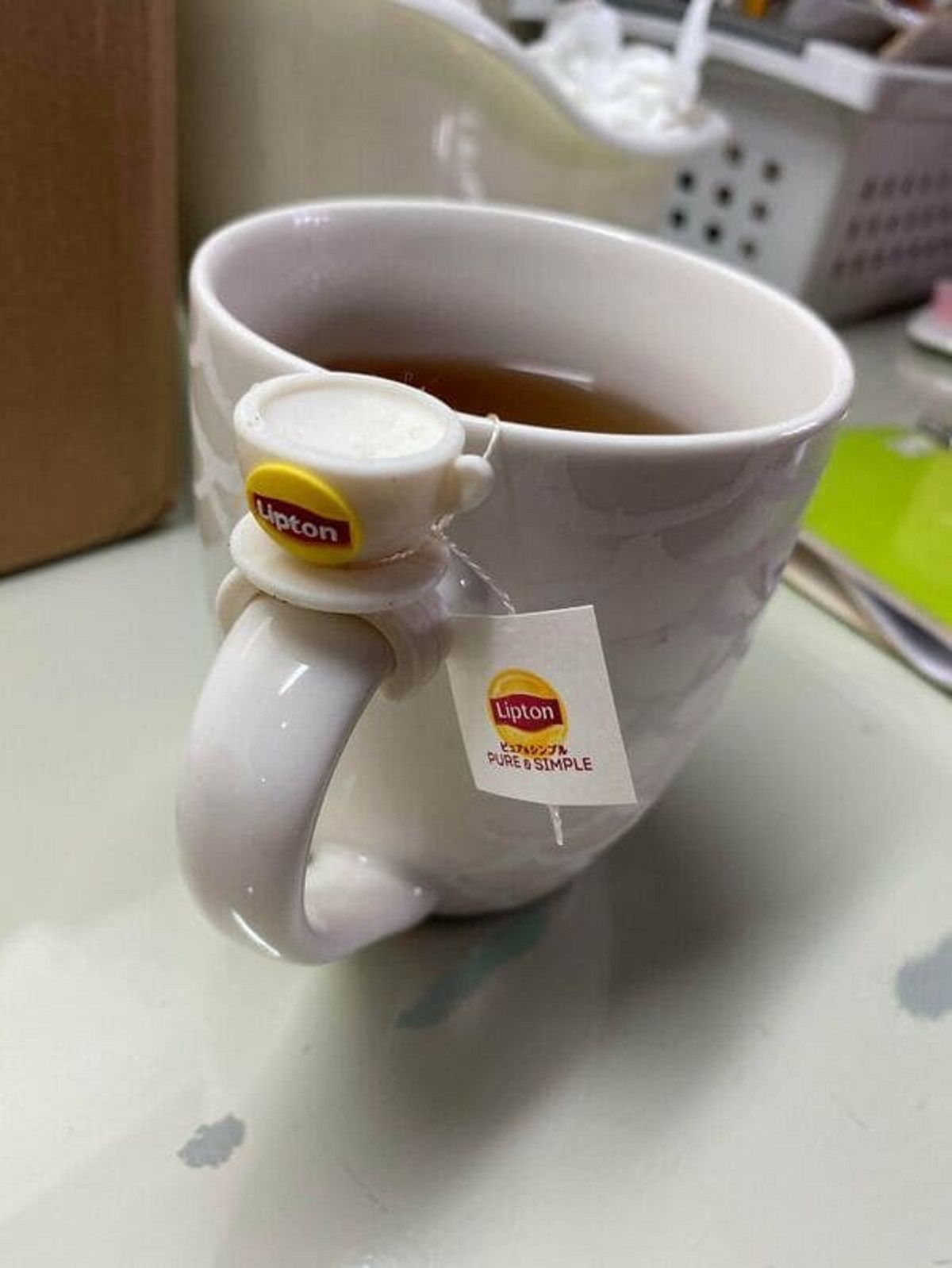 “My Lipton Tea Came With A Teacup Shaped Tea Bag Holder”