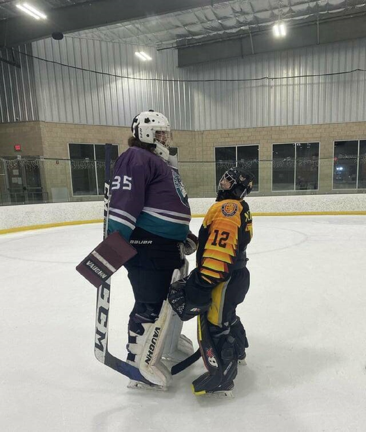 "The size difference between me and my opposing goalie the other night. I’m 5’3 w/o skates and he’s 6’7 w/o skates"