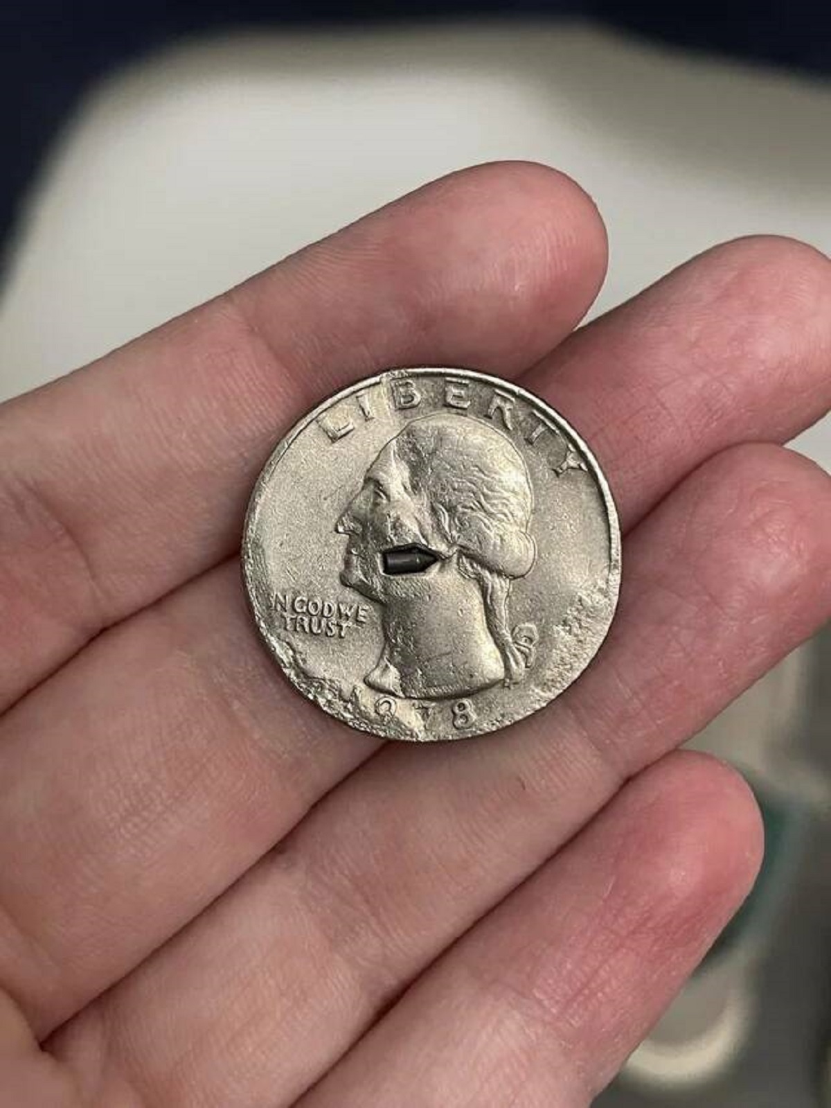 "A quarter I found today with led (possibly) in the face of it that looks like a bullet."