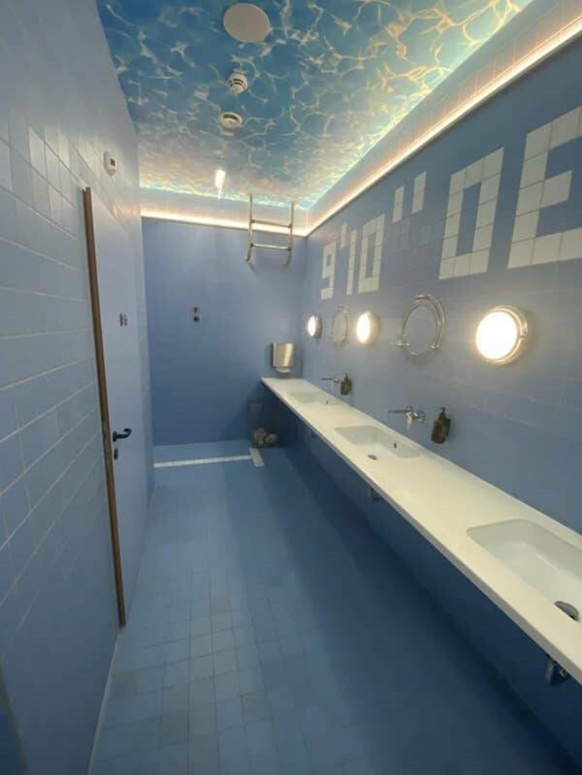 The pool-themed bathroom at a hotel in Vienna is so visually pleasing to me.