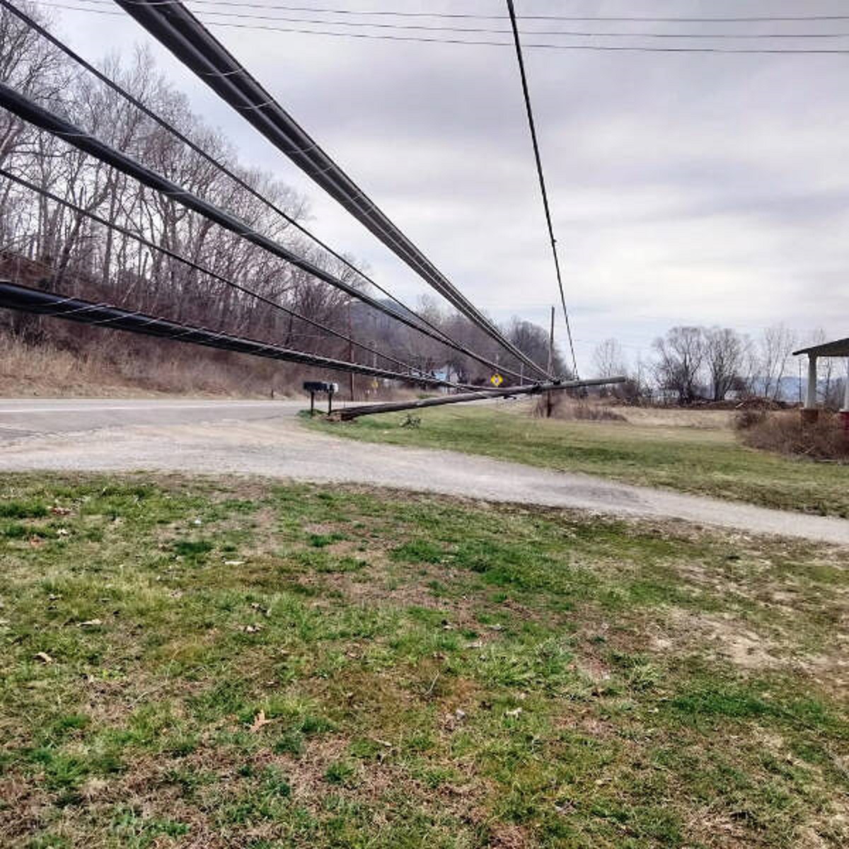 “The driveway this morning. Was leaning for 10 days, but neither the phone or electric company wanted to fix it.”