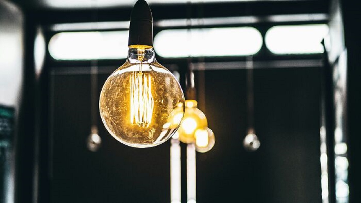 You can fit a lightbulb into your mouth, but will likely have a  very hard time of a time getting it out.