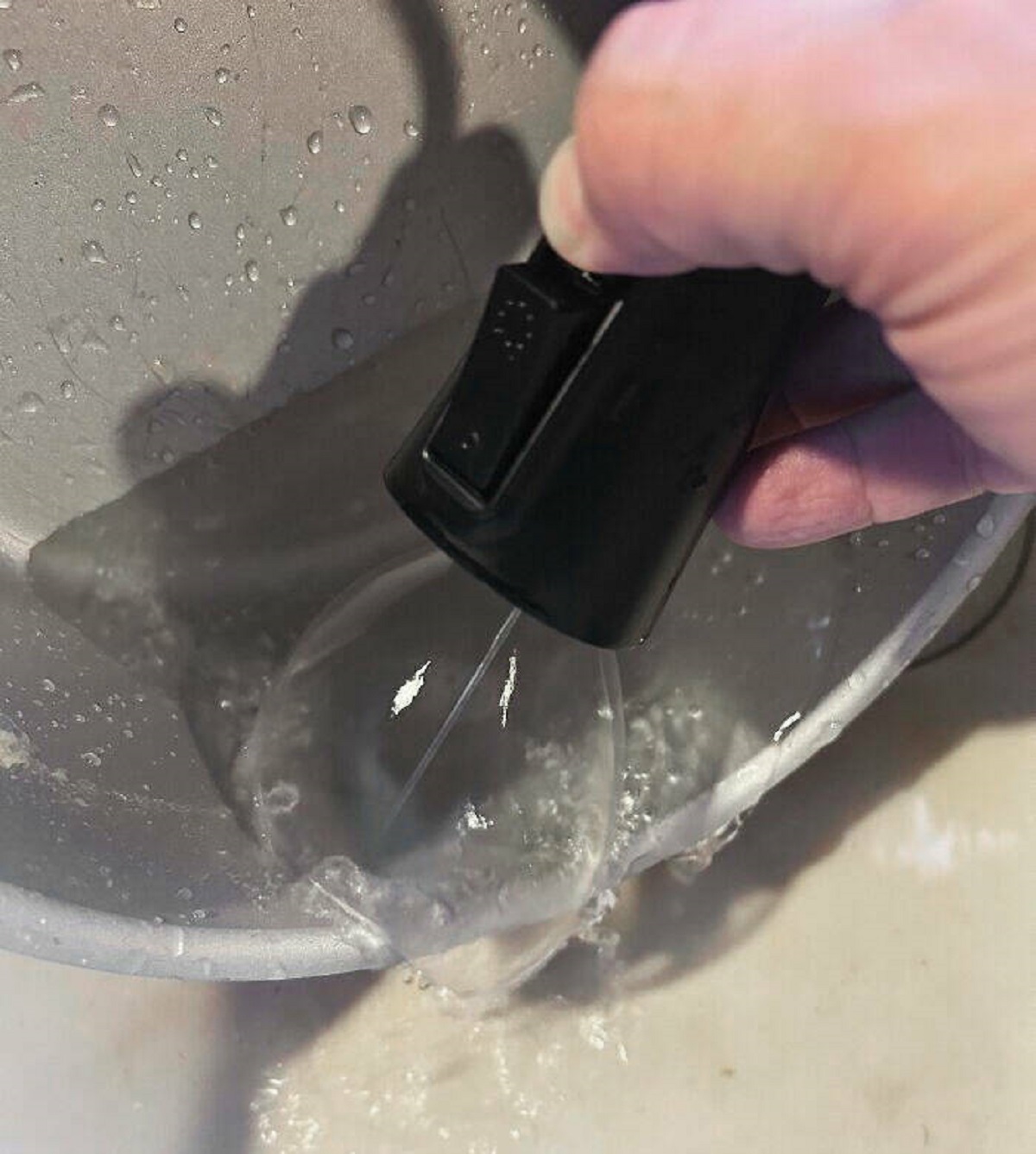 "My Sink Sprayer Has A Tough Spot Remover. It Shoots A High-Pressure Stream Down The Middle That Is Surprisingly Powerful, But A Cone Of Water Around It Blocks All The Splashes"