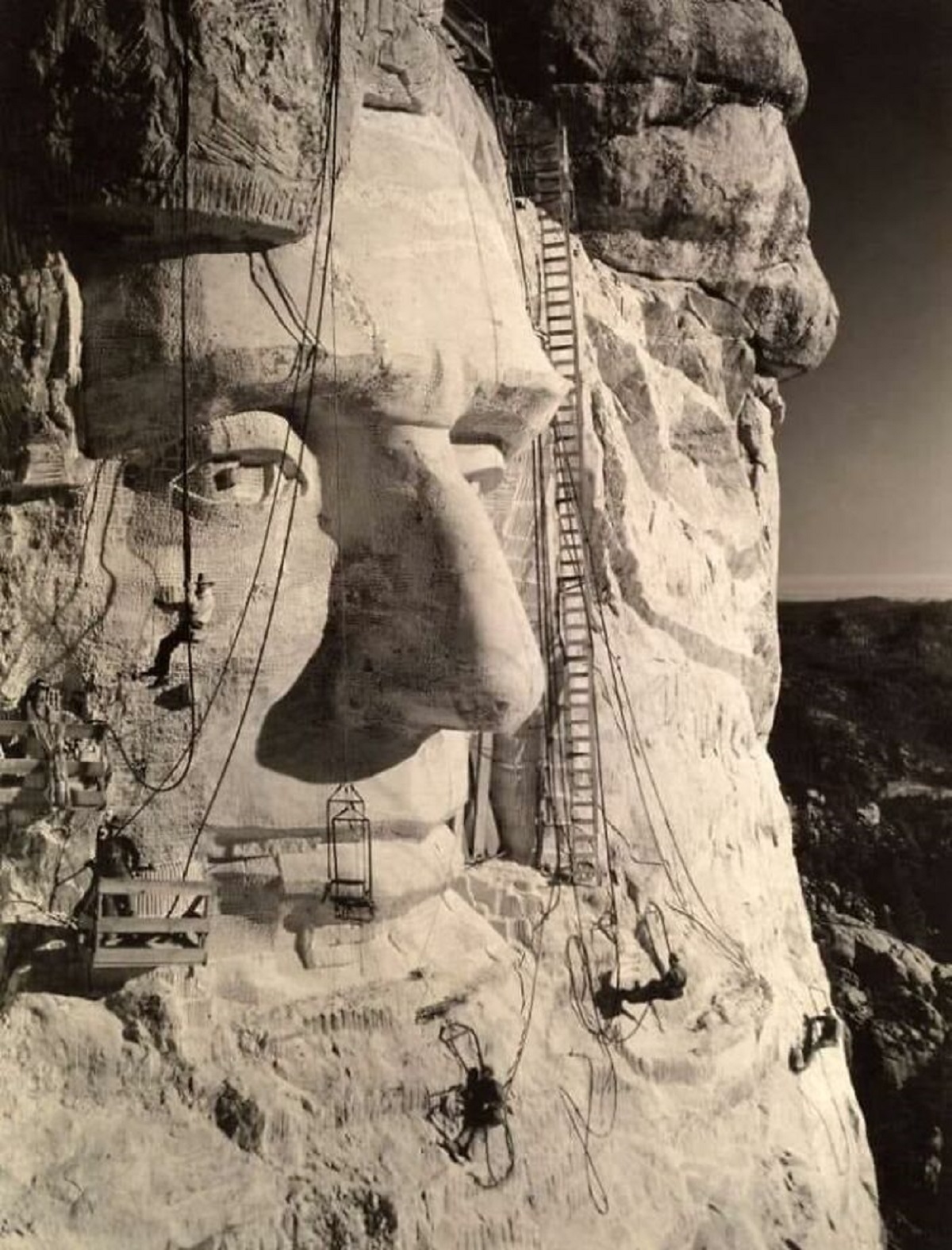 Sculpting begins on the face of Lincoln , Mount Rushmore , Black Hills National Forest , SD , 1927