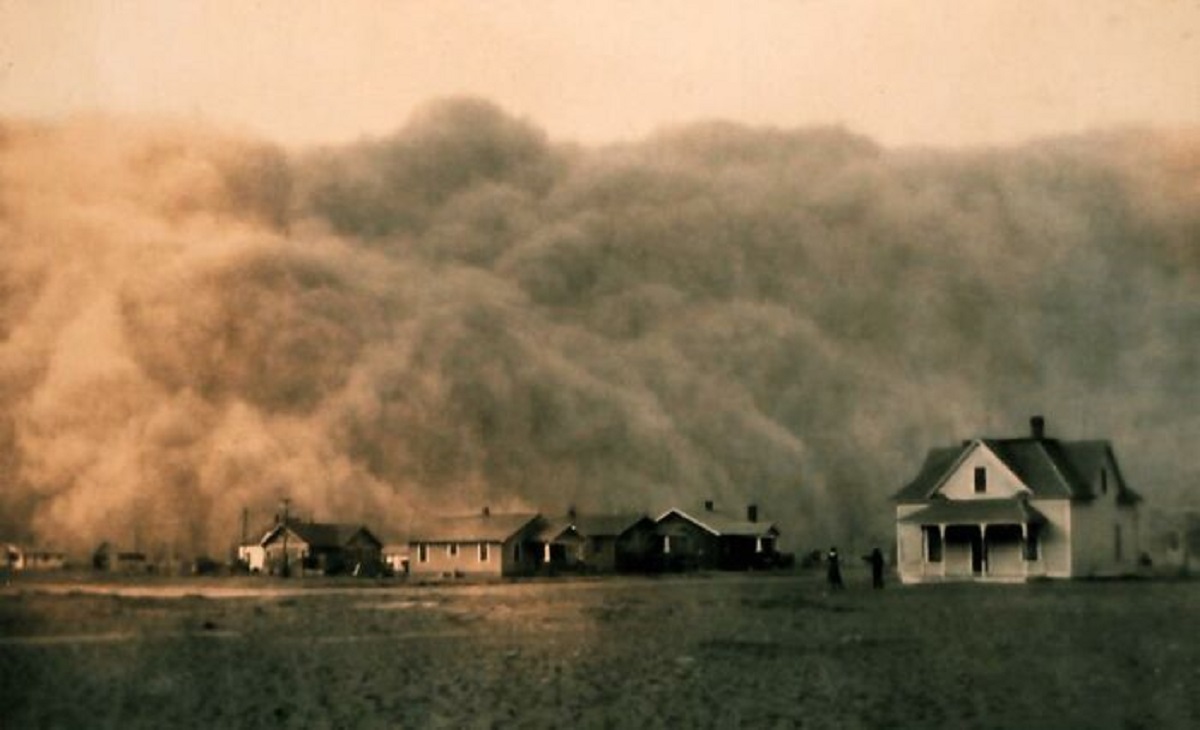 Life in the Texas Dust Bowl, 1935. A dust storm gets ready to engulf everything in its path.