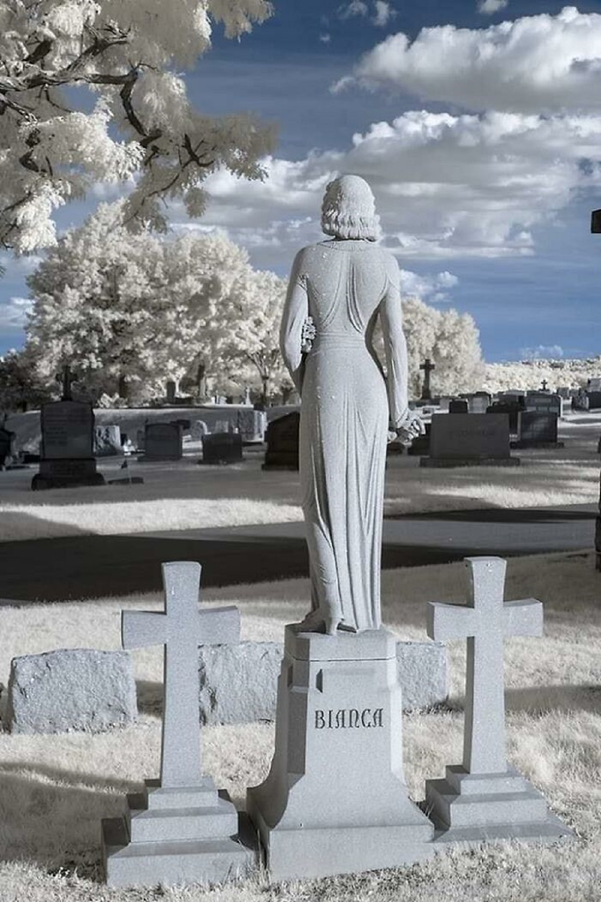 The mysterious Bianca Deconciliis. A life size statue of a young woman who died at 20 in 1942. Calvary Cemetery, Pittsburgh, PA.