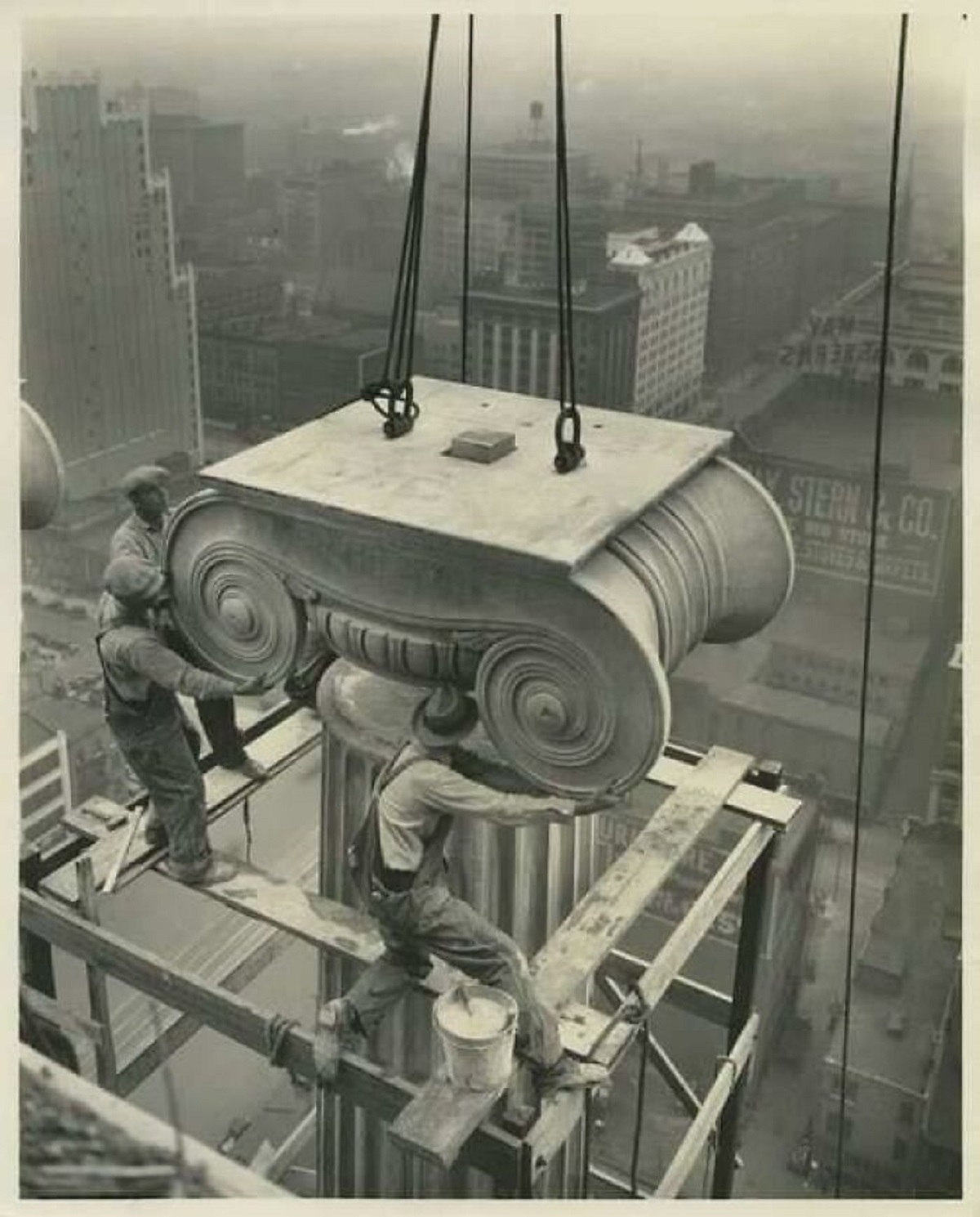 Installing a Greek column at the Civil Courts Building in St. Louis around 1929.