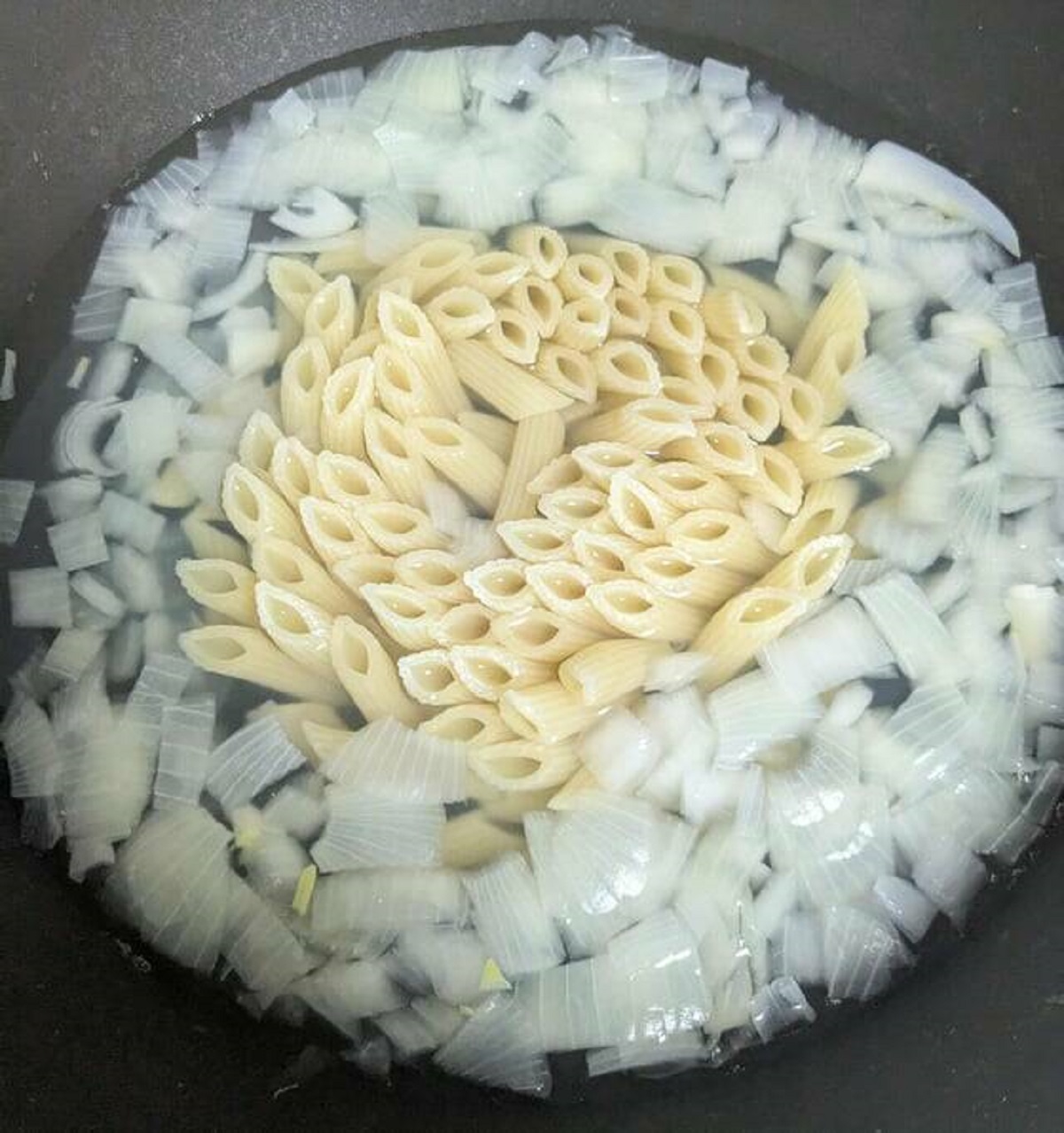 "I added onion when cooking pasta and it organized into a spiral"