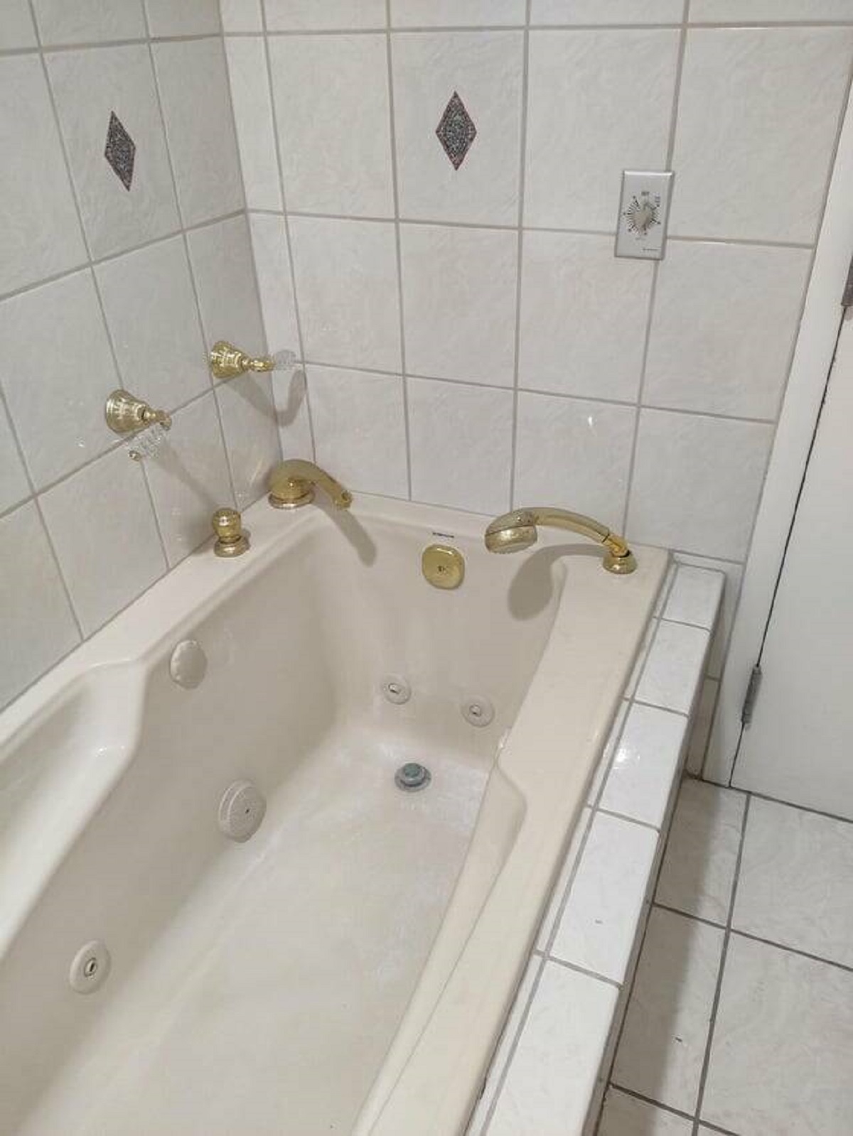 "Gas station convenience store has an upstairs bathroom with this tub in it"