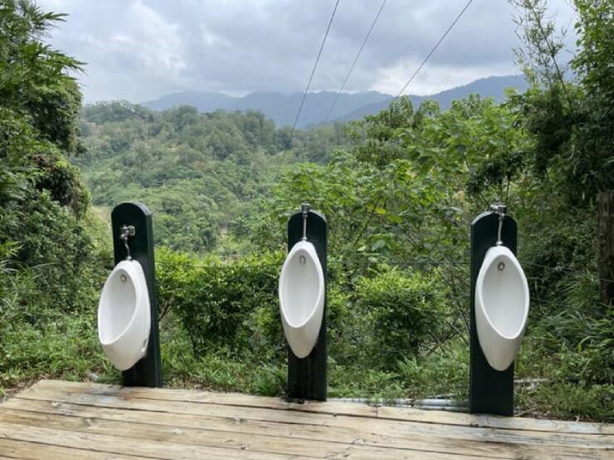 "Urinals in a zoo offer users a nice view of the surrounding area"