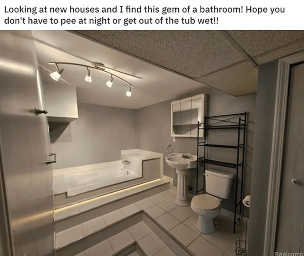 interior design - Looking at new houses and I find this gem of a bathroom! Hope you don't have to pee at night or get out of the tub wet!! Realcomp