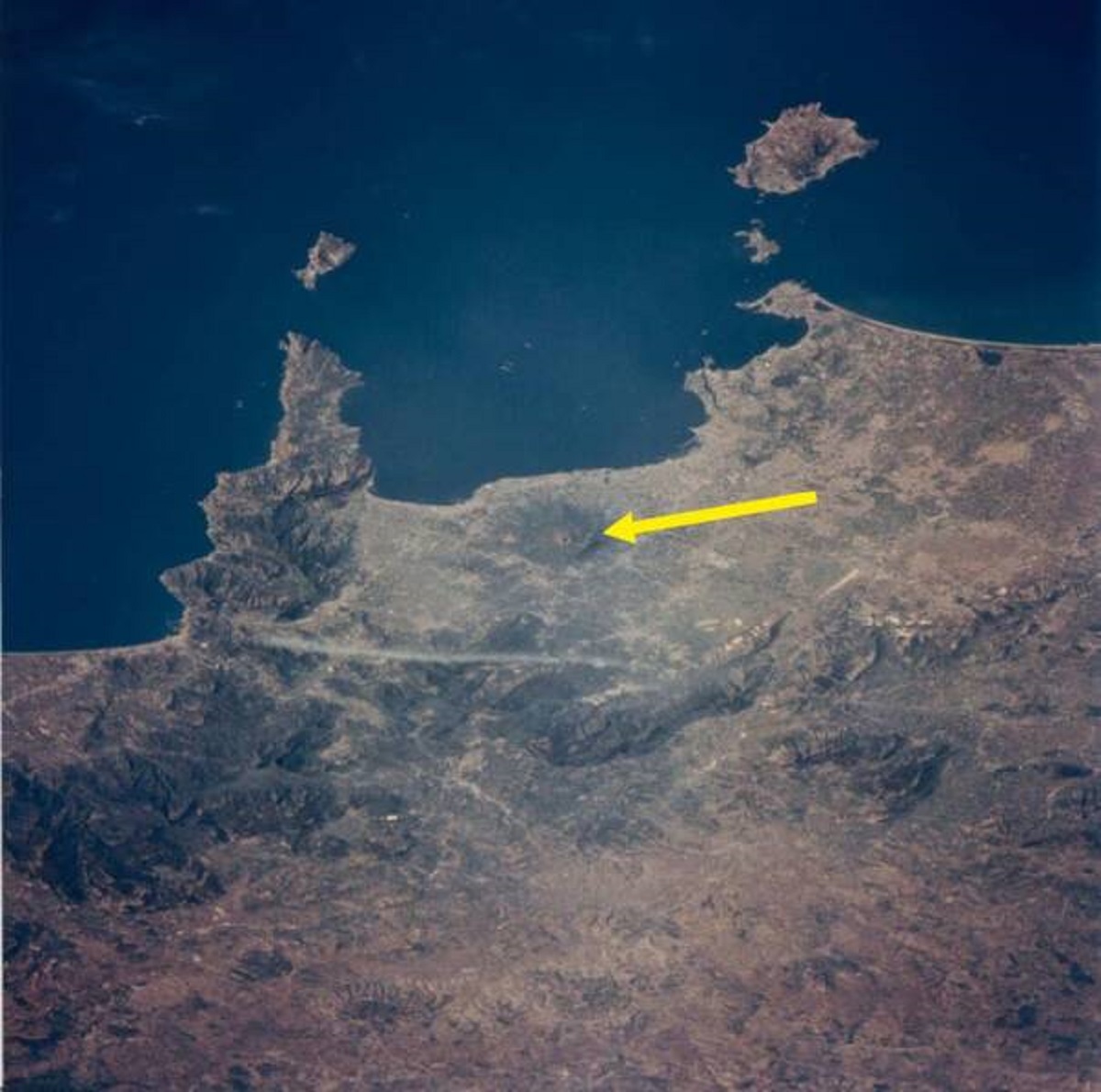See that little hole there? This is what Mount Vesuvius looks like from space: