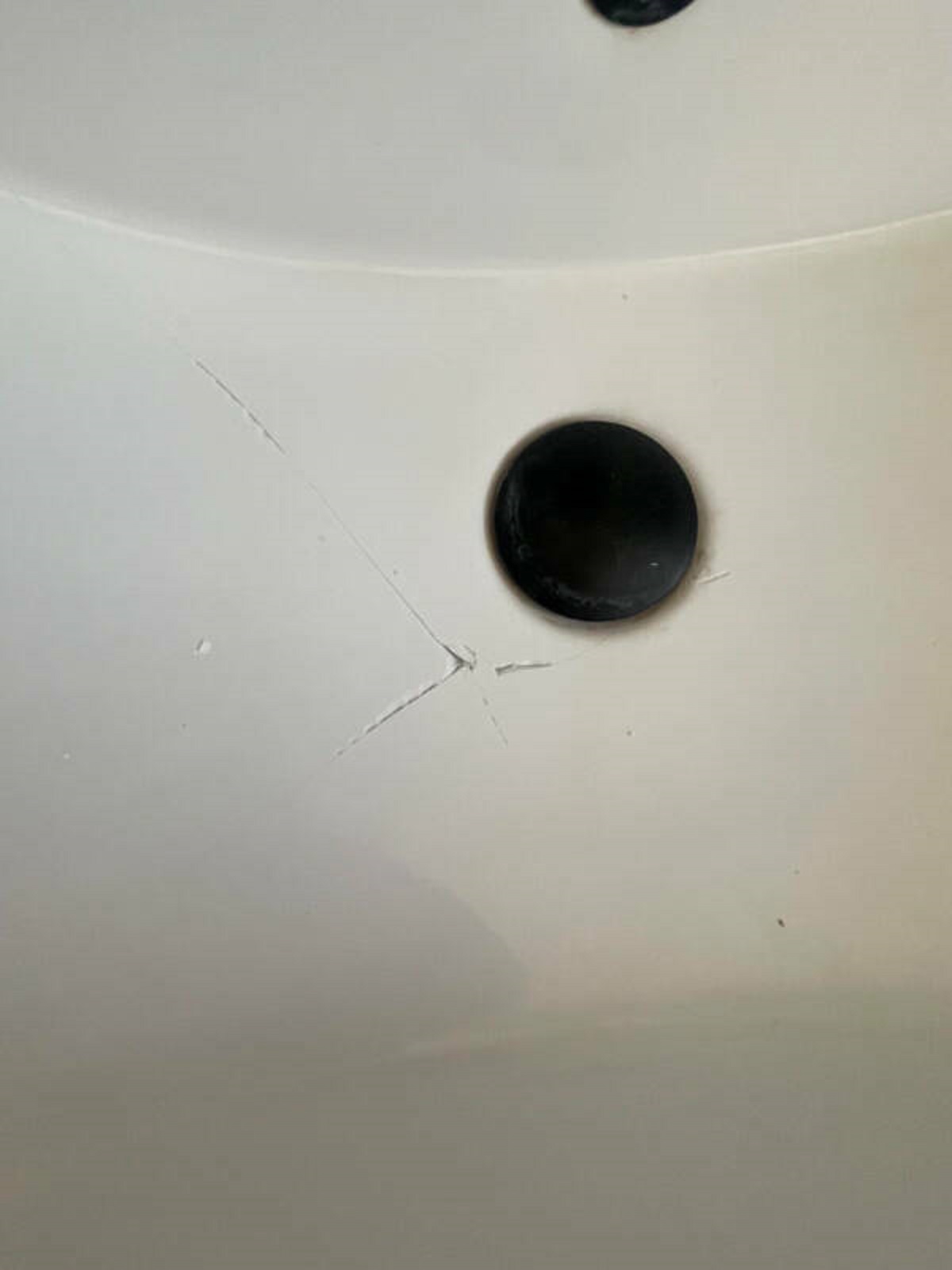 “My girlfriend’s perfume fell from the medicine cabinet and broke our sink.”