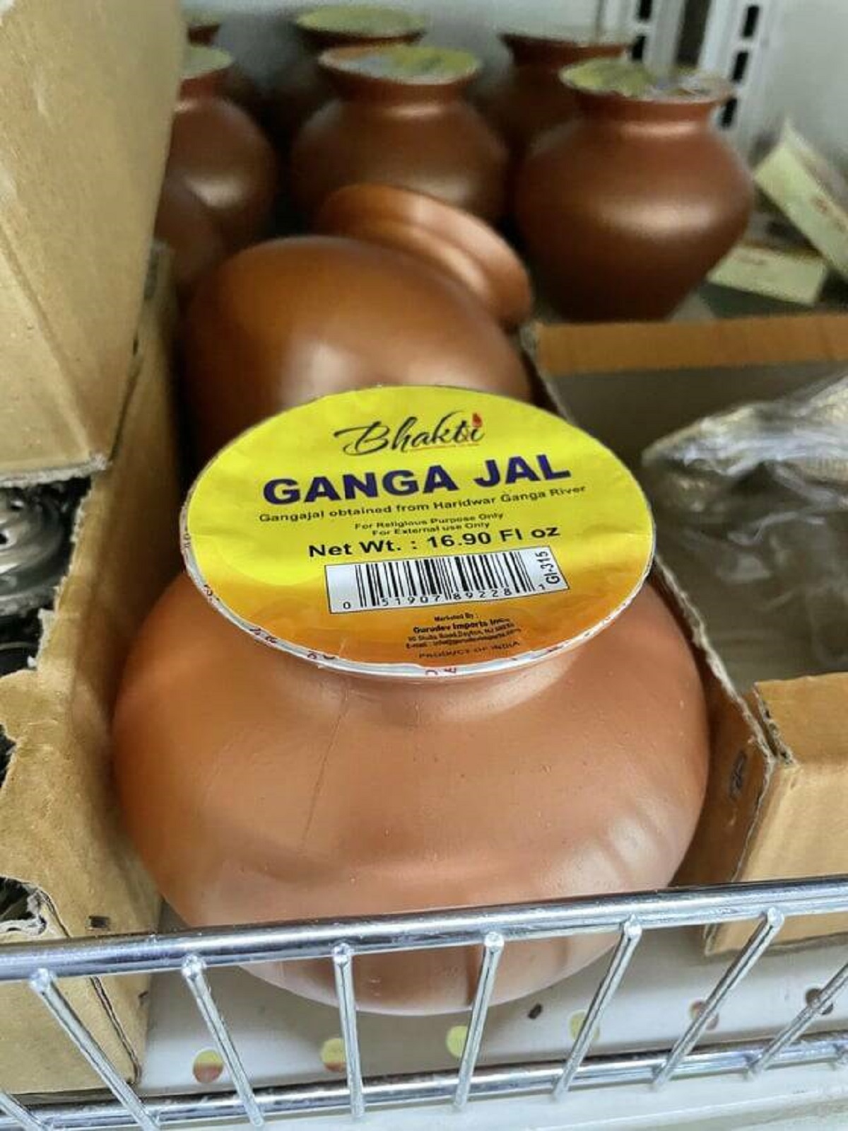 chocolate - Bhakti Ganga Jal Gangajal obtained from Haridwar Ganga River For Religious Purpose Only For External use Onty Net Wt. 16.90 Fl oz 113 1987189228 Marksted By Gurudev Imports In