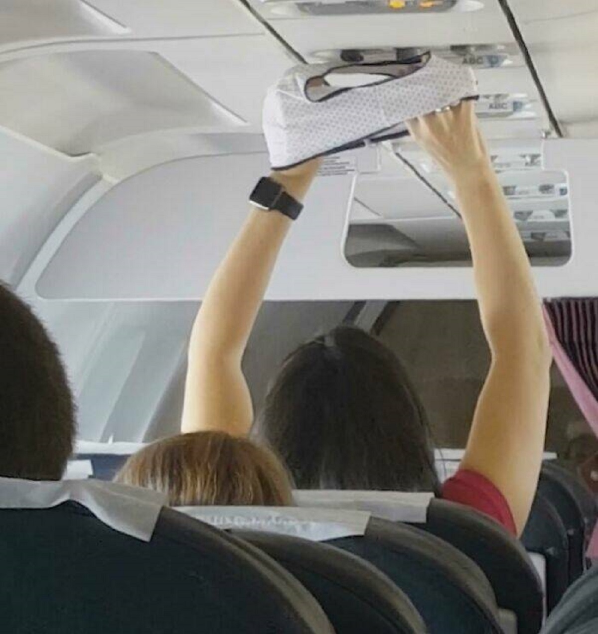 "Drying The Undies In Front Of The Plane's AC"