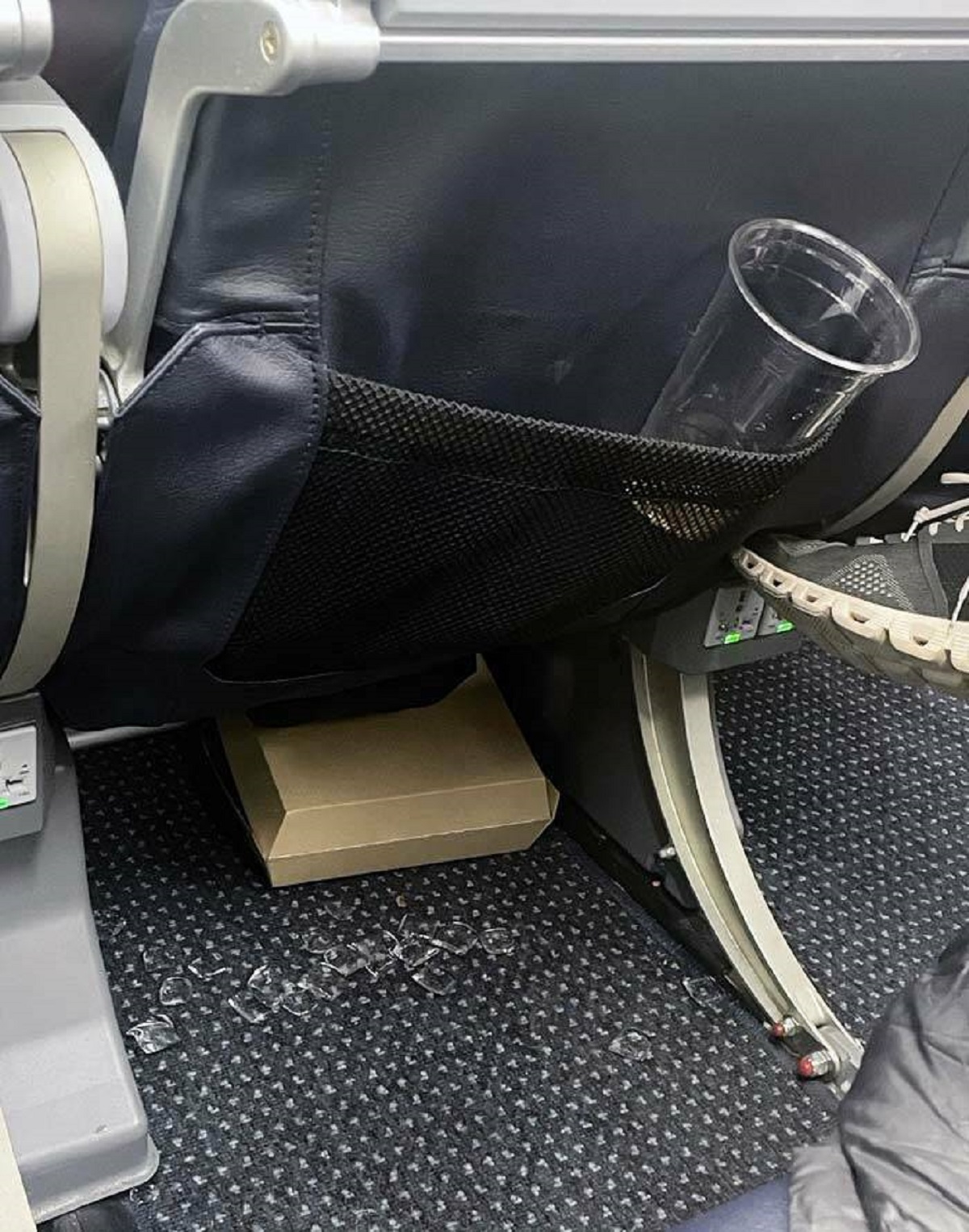 "The Lady Next To Me On The Plane Spilled Her Whole Drink, Got Up, And Moved Over One Seat. She Just Left All The Ice On The Floor And Kicked Her Empty Food Carton Under"