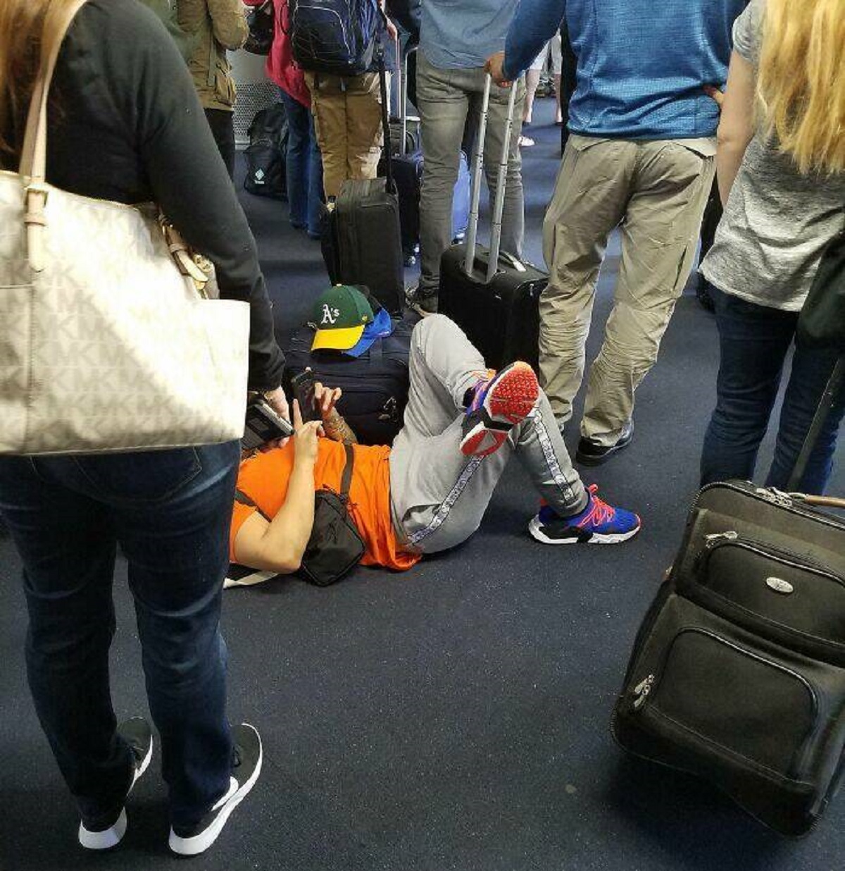"This Guy Making Everyone Walk Around Him To Board Their Plane"