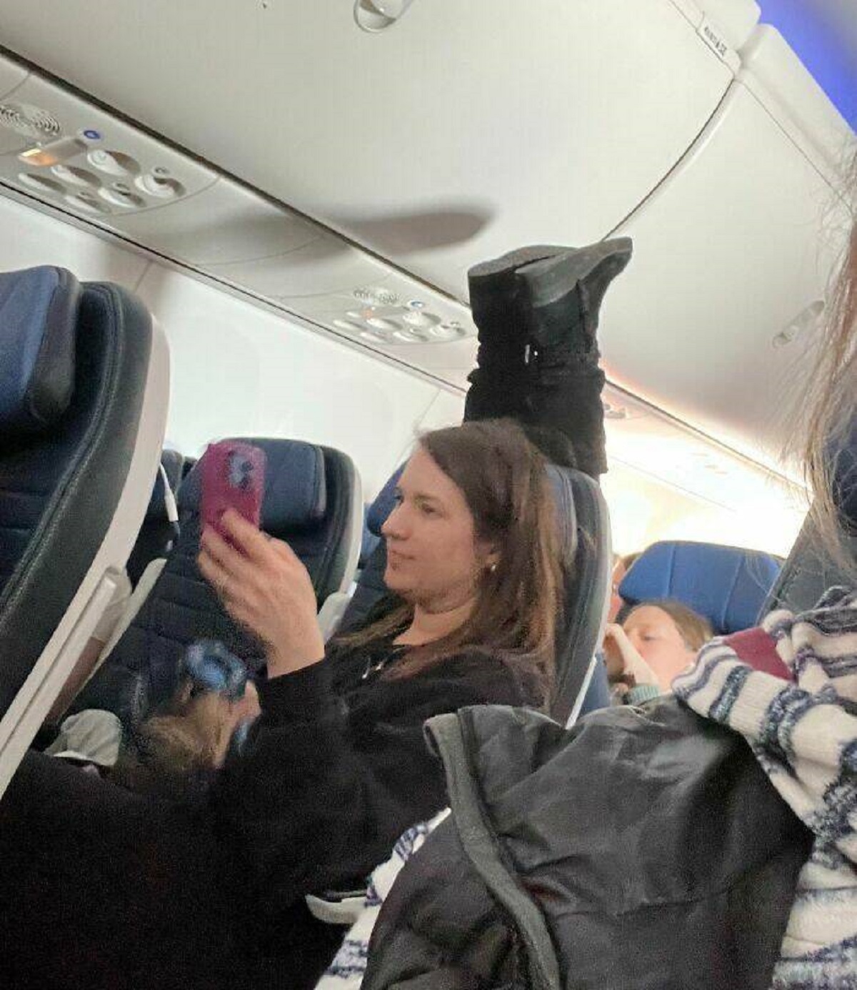 "Today On A Flight From Philadelphia To Denver. That’s My Sister In Front Of Her"