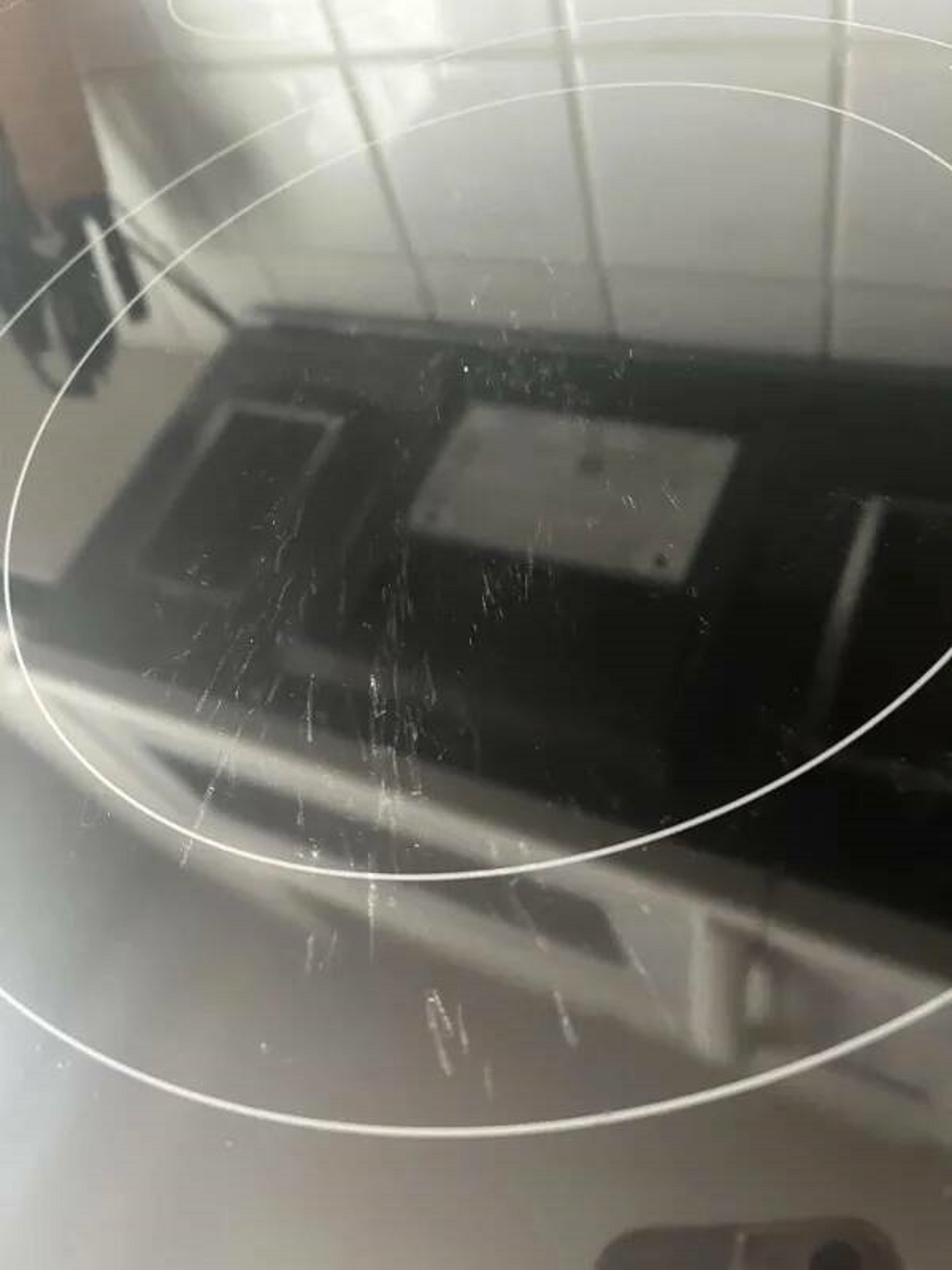 “My fiancé scratched the hell out of our glass stove top. We have had it for 6 days.”