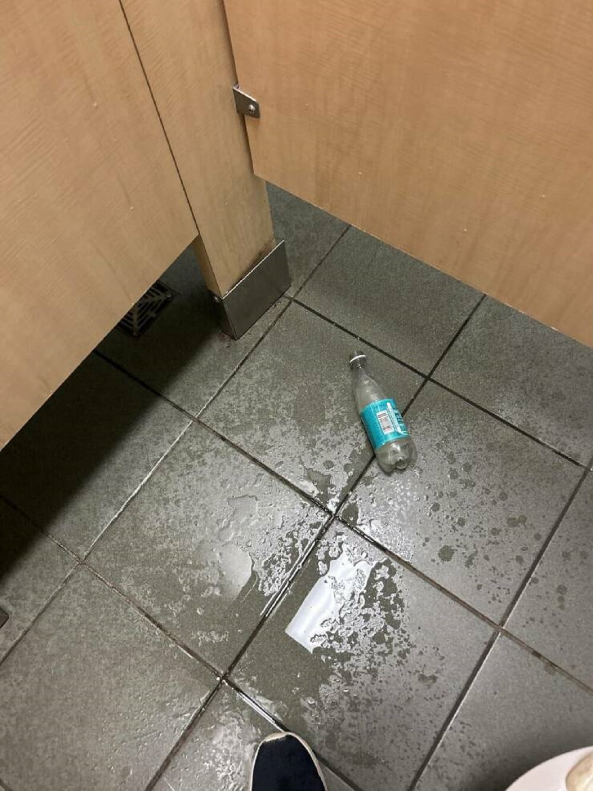"Some kid thought it would be funny to drop a whole open bottle of soda on me while I was taking a dump"